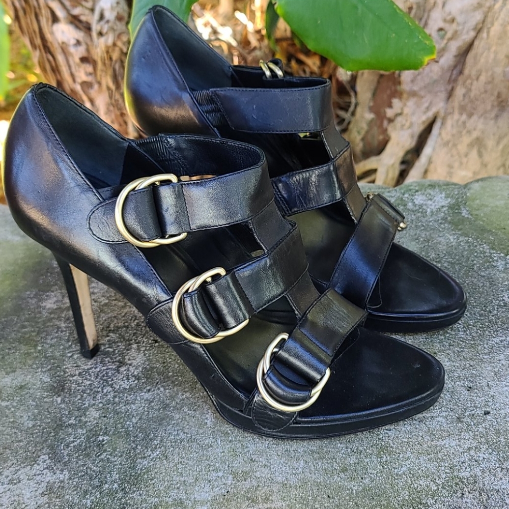 Cole Haan black buckled leather heel